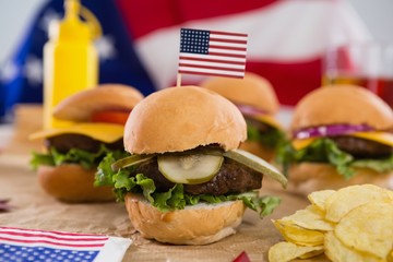 Close-up of burger decorated with 4th july theme