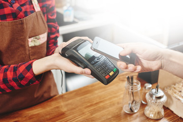 Contactless payment by phone.