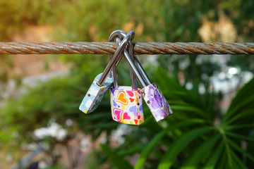 Group of fancy lock on the sling wire on believe of forever love