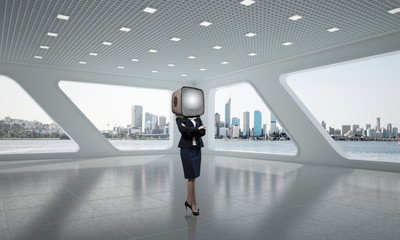 Business woman with an old TV instead of head.