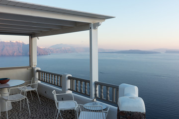 Fototapeta na wymiar Terrace with view of the Mediterranean Sea in Oia, Santorini