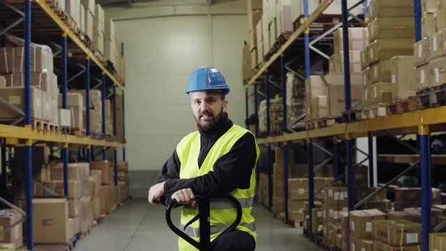 Portrait of a worker in a warehouse.