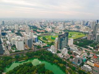 Fototapeta na wymiar Skyscraper of Bangkok business district with gree park