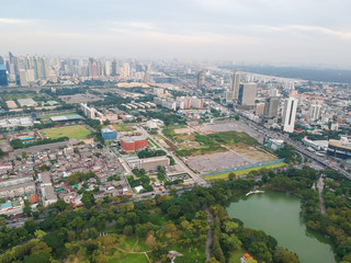 Skyscraper of Bangkok business district with gree park