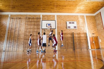 Player scoring a goal while playing basketball