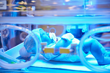 Mock-up of child in intensive care incubator