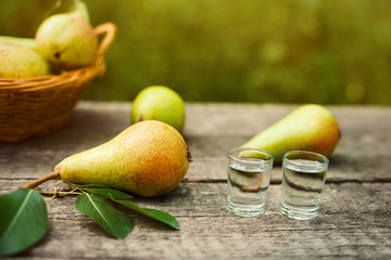Fresh pears and brandy in shot glass