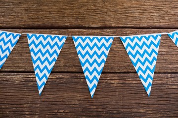 Obraz premium Bunting arranged on wooden table