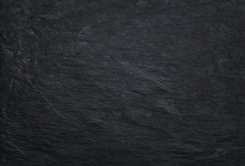 Black stone background, texture with copy space