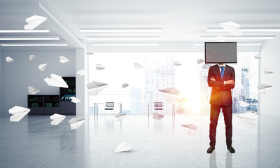 Businessman with TV instead of head.