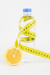  tape measure wrapped water bottle with lemon
