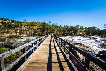 Fototapeta premium bridge over flooding Bells Rapids