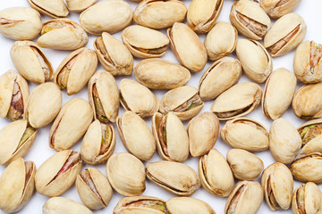 Roasted pistachios nuts isolated on white background