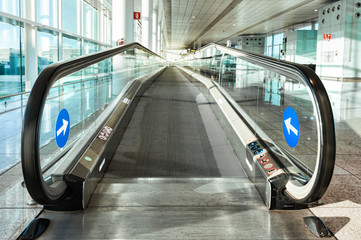 The entrance to the escalator at the airport