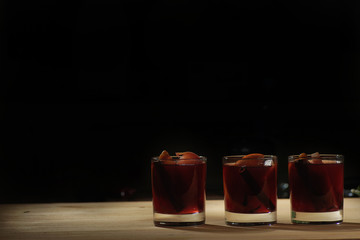 Hot wine drink. Warm Christmas wine. Mulled wine with oranges an