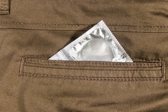 Condom in back pocket of brown pants