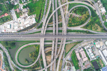 Traffic circle expressway road with green tree