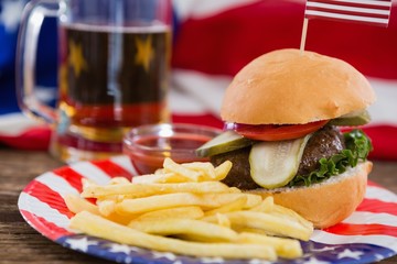 Burger on wooden table with 4th july theme