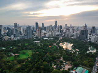 Bangkok skyline with green park sunset