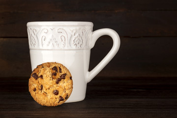 Chocolate chips cookie, hot chocolate, and place for text