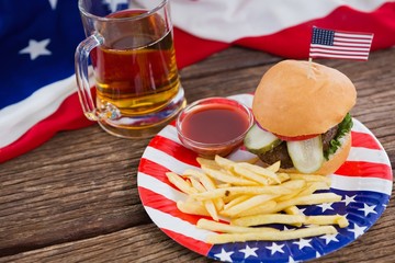 Burger on wooden table with 4th july theme