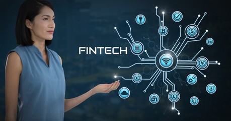 Businesswoman with hands palm open and Fintech with various