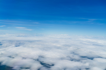 Naklejka premium Aerial photos Shows lots of clouds like the sea. And the atmosphere of the airport.Including downtown Loei.