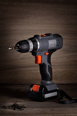 Close up Electric drill on rock table background and copy space.