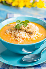 Tomato soup with rice.