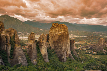 Landscape of monasteries of Meteora in Greece in Thessaly at the early morning. Cliffs of Meteora...