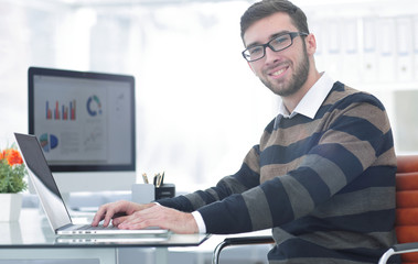 Fototapeta premium successful employee at a Desk