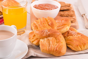 Breakfast with brioches.