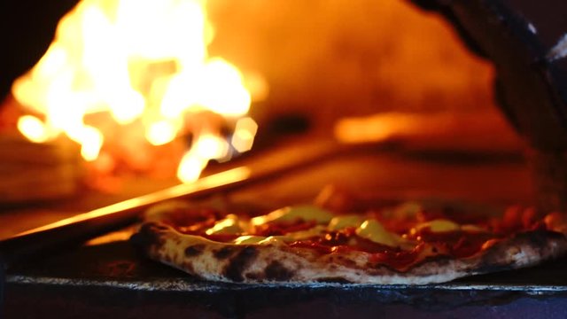 Pizza in traditional Neapolitan oven