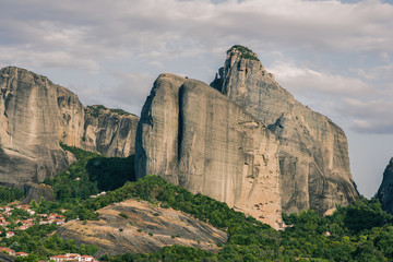 Landscape of monasteries of Meteora in Greece in Thessaly at the early morning. Cliffs of Meteora...