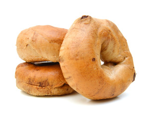 Two freshly baked cinnamon raisin bagels