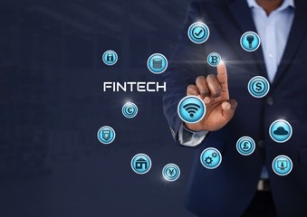 Businessman touching Fintech with various business icons