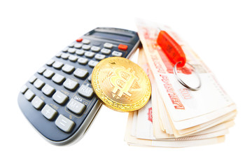 Bitcoin coin, calculator and russian money isolated on white background