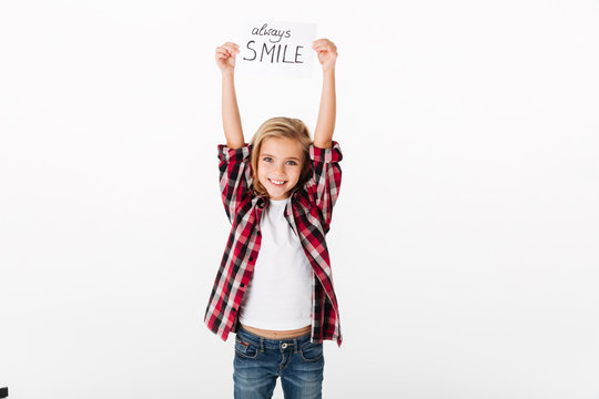 Full length portrait of a cheery little girl