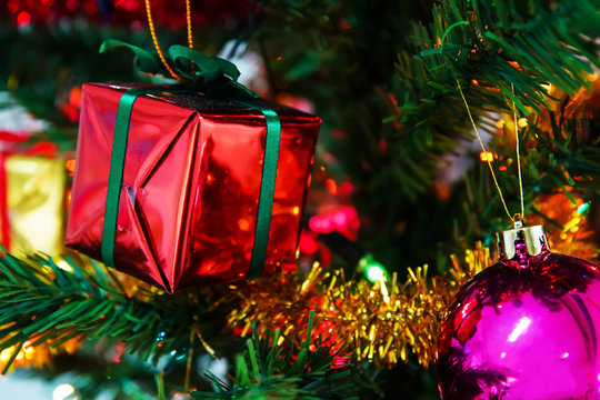 Beautiful decorated fireplace and Christmas tree at home.