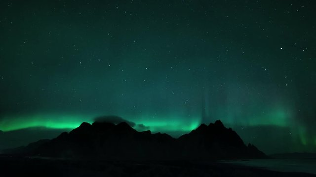 Aurora Borealis Dances Over Stokksnes And Vestrahorn Mountain Range