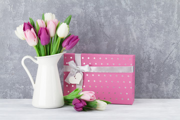 Colorful tulips bouquet and gift box