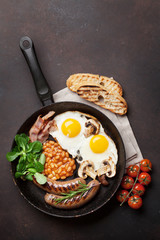 English breakfast. Fried eggs, sausages, bacon