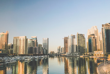 Obraz na płótnie Canvas Dubai. The waterfront of Dubai Marina in the early morning. Toning instagram. 