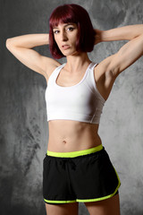 Fototapeta na wymiar Frau in Sportbekleidung für Sport, Workout, Fitness und Training
