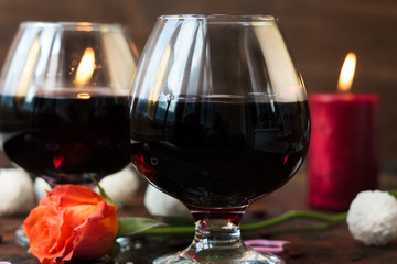 Romantic dinner concept - wine in glasses for lovers.