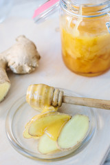 Fototapeta na wymiar Healthy eating - honey and ginger root slices.