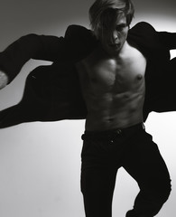 Handsome guy with an athletic body, dancer
