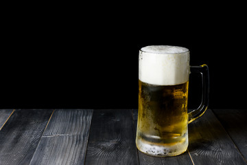 glass beer on a wooden table