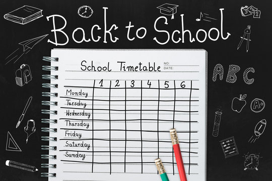 Schedule at school for the whole week. Hand-drawn table with a lesson plan for the whole week. Back to school and a new schedule. Drawings about school subjects.
