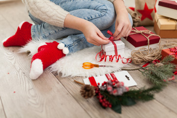 Teenage girl with Christmas presents